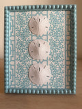 White Sand Dollar Trio on Coral and Lattice